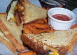 Andouille sausage grilled cheese with caramelized onions and sweet  potato fries!!!