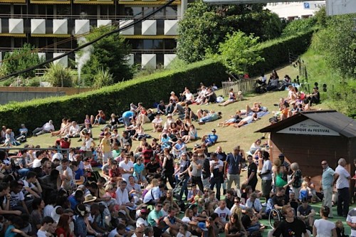 Fest goers lounging outside the Park stage.