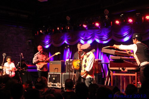 Nigel Hall connecting with John Scofield (Photo by Phrazz)